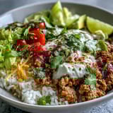 Seasoned ground turkey, fluffy rice, and colorful toppings make this Turkey Taco Bowl a wholesome, vibrant dinner.