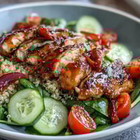 Vibrant Lemon Vinaigrette Grilled Chicken and Veggie Bowl with colorful fresh vegetables and zesty lemon dressing.